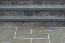 Flagstone walkway, steps with stone veneer and flagstone on top